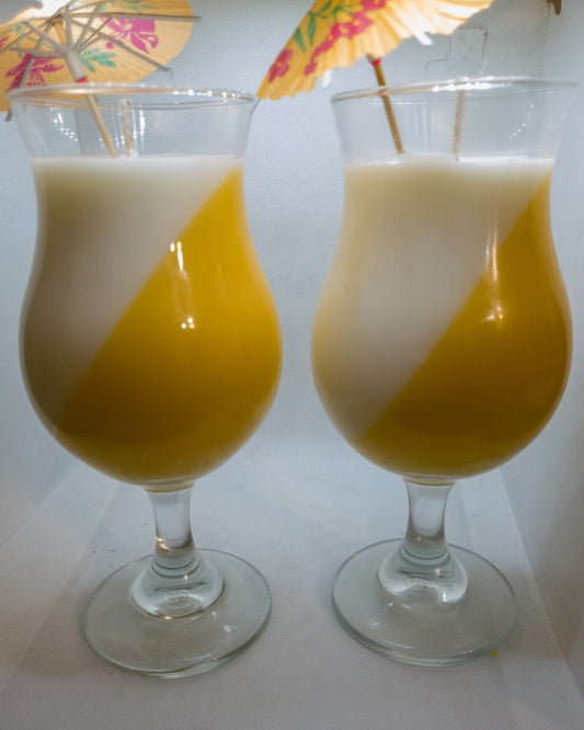 2 Scent candles in a wine glass, filled with your color and favorite scent. Visit Now: www.lovedbymecreations.com